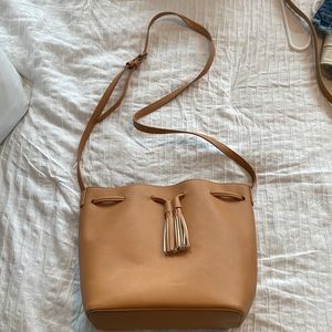 J crew camel/tan faux leather drawstring crossbody bucket bag with tassels